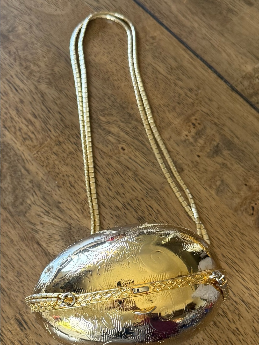 Gold Oval Embossed Evening Clutch